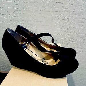 Women’s black suede Mary Jane’s